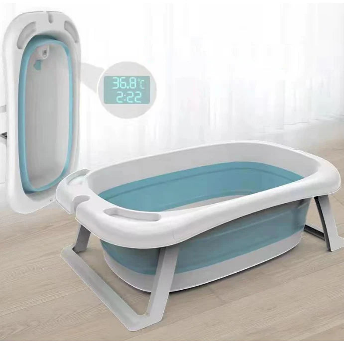 Cadita pliabila cu termometru incorporat si perna, Dimensiuni 83 x 50 x 20 cm, Material PP/TPE, Pliere rapida, Usor de utilizat, Picioare antiderapante, Varsta 0-3 ani, Structura Solida, Culoare Albastru